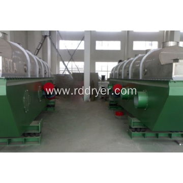 Vibrating fluid bed drier for cooling raw material